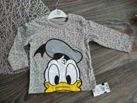 Футболка з довгим рукавом...